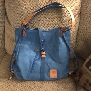 Blue multi-way bag. Jean material